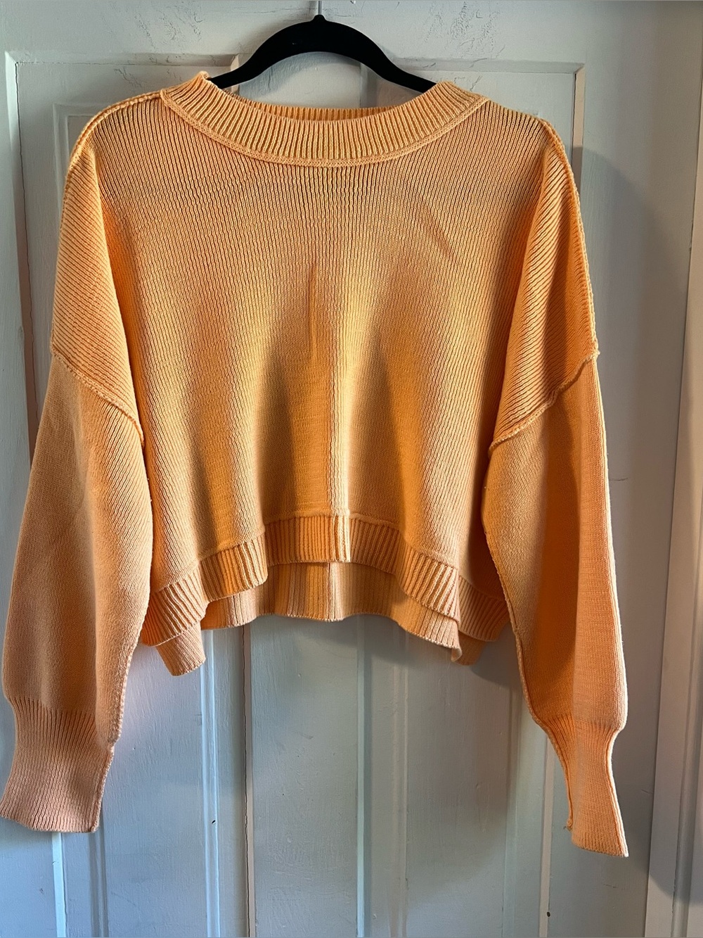 Pink Rose Women's Cropped Crewneck Sweater in a pretty melon orange color